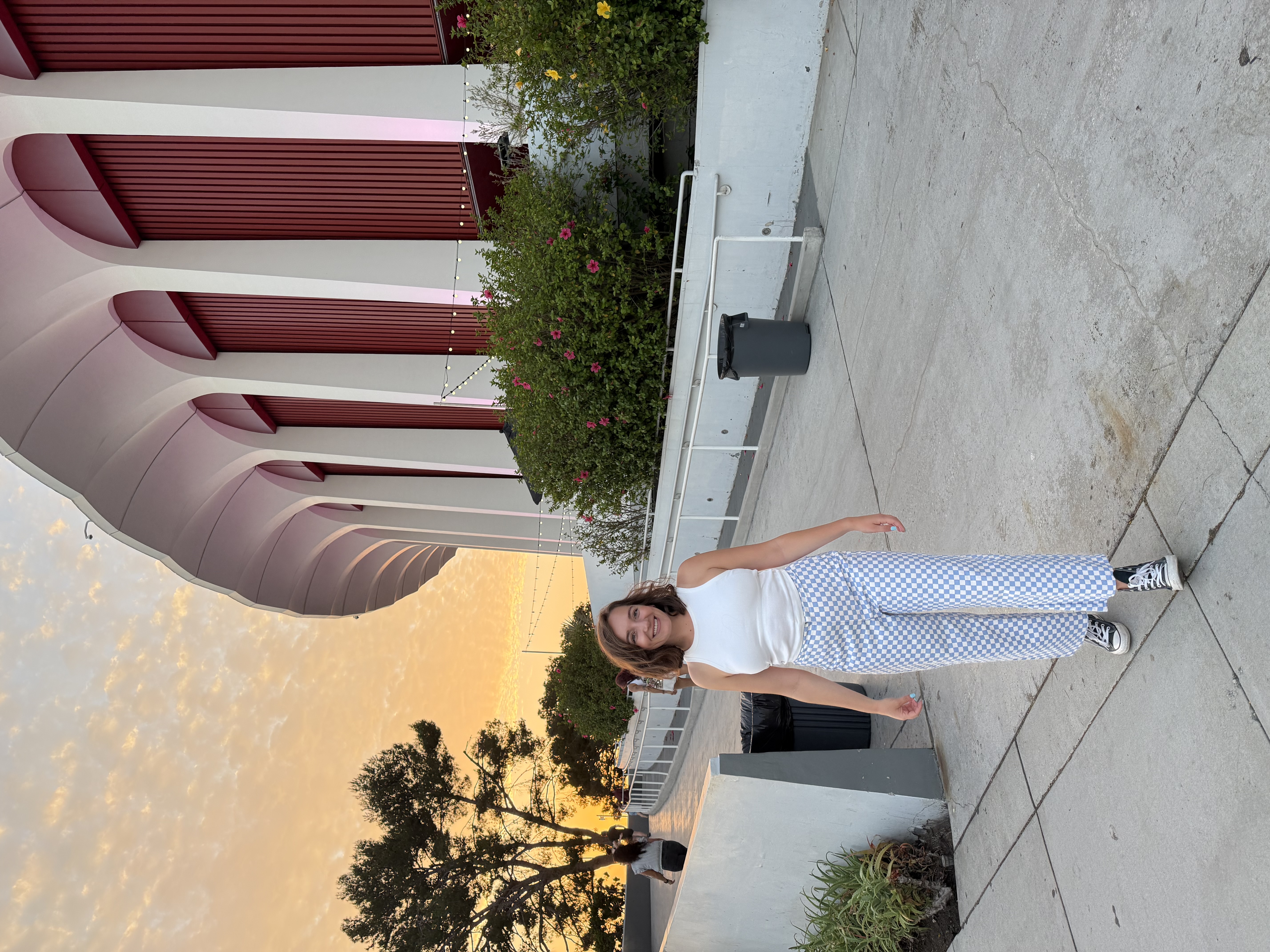 Emily wearing the finished Maple Culottes in white and light blue checked denim